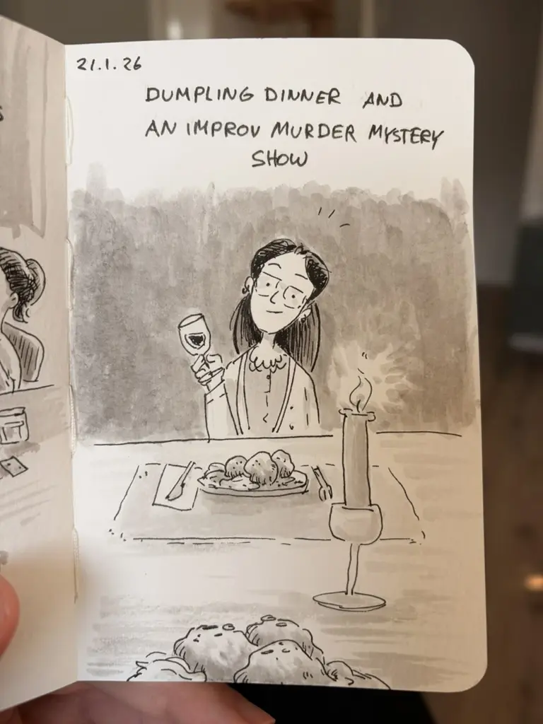 Anna raises a wine glass over a dumpling dinner, with an improv murder mystery show in the evening plans.