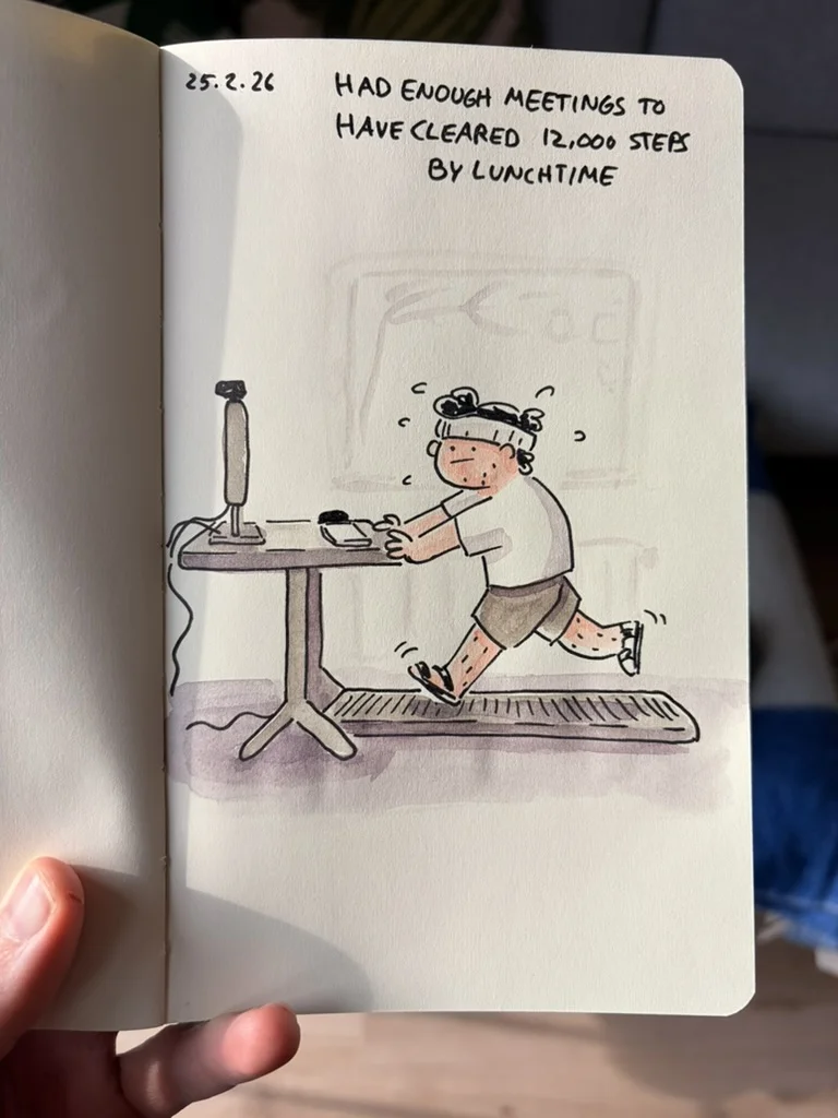 Marcel works at a desk while running on a treadmill.
