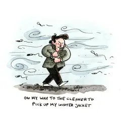 Marcel walks through strong wind on his way to pick up his winter jacket.