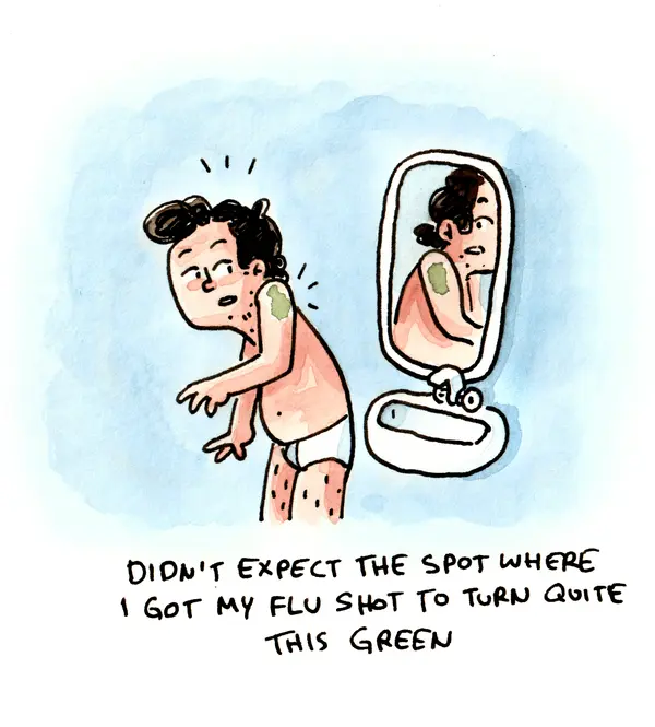 Marcel looks at a green mark on his shoulder in a mirror.